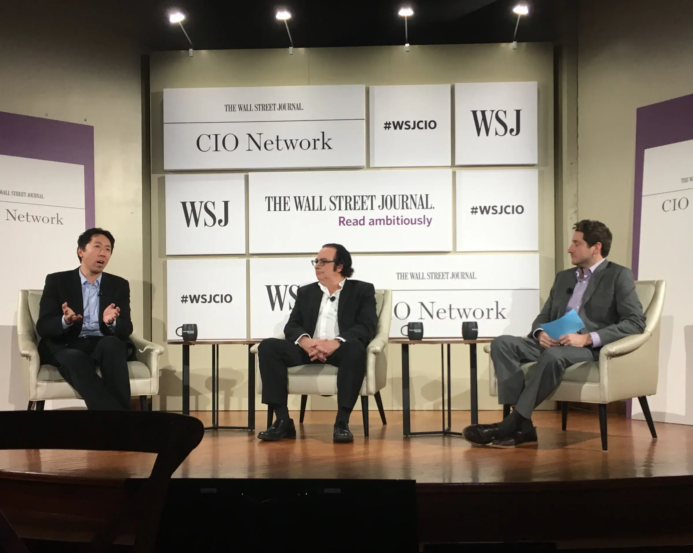Andrew Ng speaking at an artificial intelligence dinner in 2017