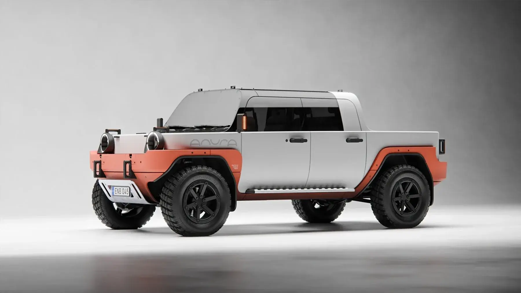 Front view of the boxy ANURA rural vehicle concept with two winches and removable headlights