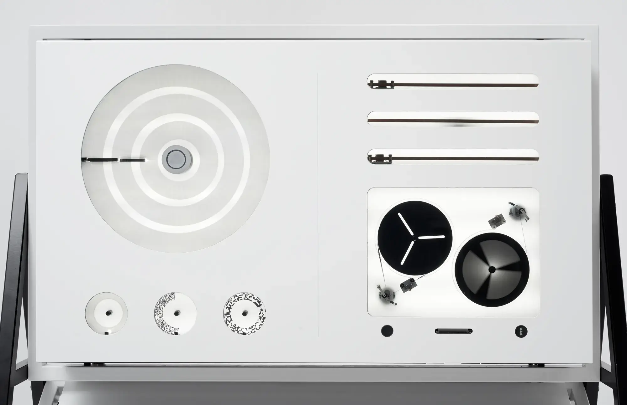 White APPARATUM modules containing magnetic tape, motors and optical discs