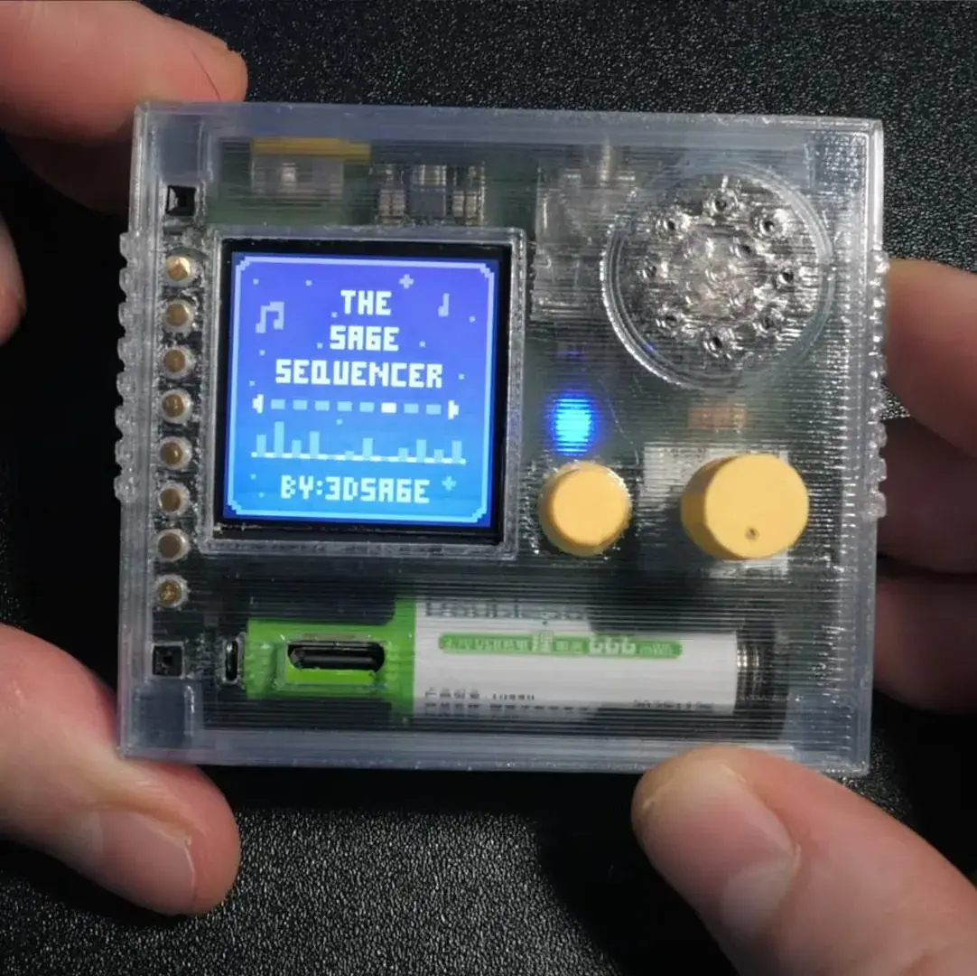 The sequencer with its transparent enclosure and visible electronics