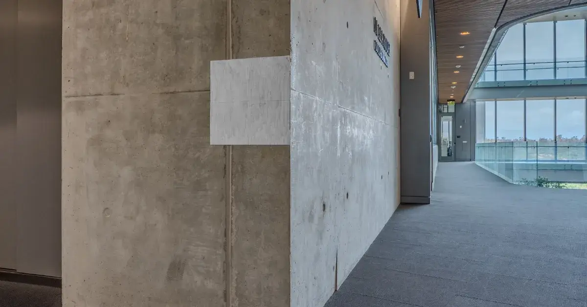 A light FlowForm tile fixed to a dark wall to reflect millimeter-wave signals