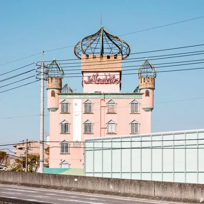 Japanese love hotel photographed from the roadside by François Prost