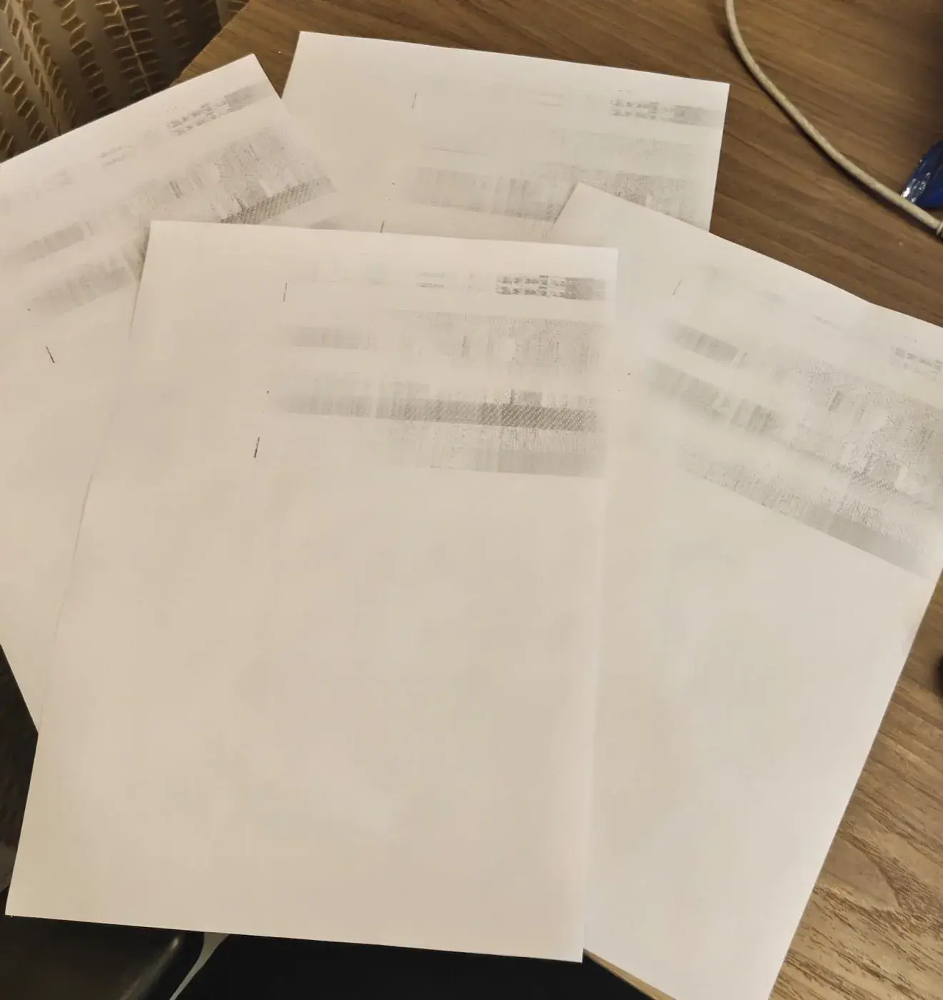 Page with repeated black raster stripes printed by the HP Laser 1008a before the SPL3 format fix