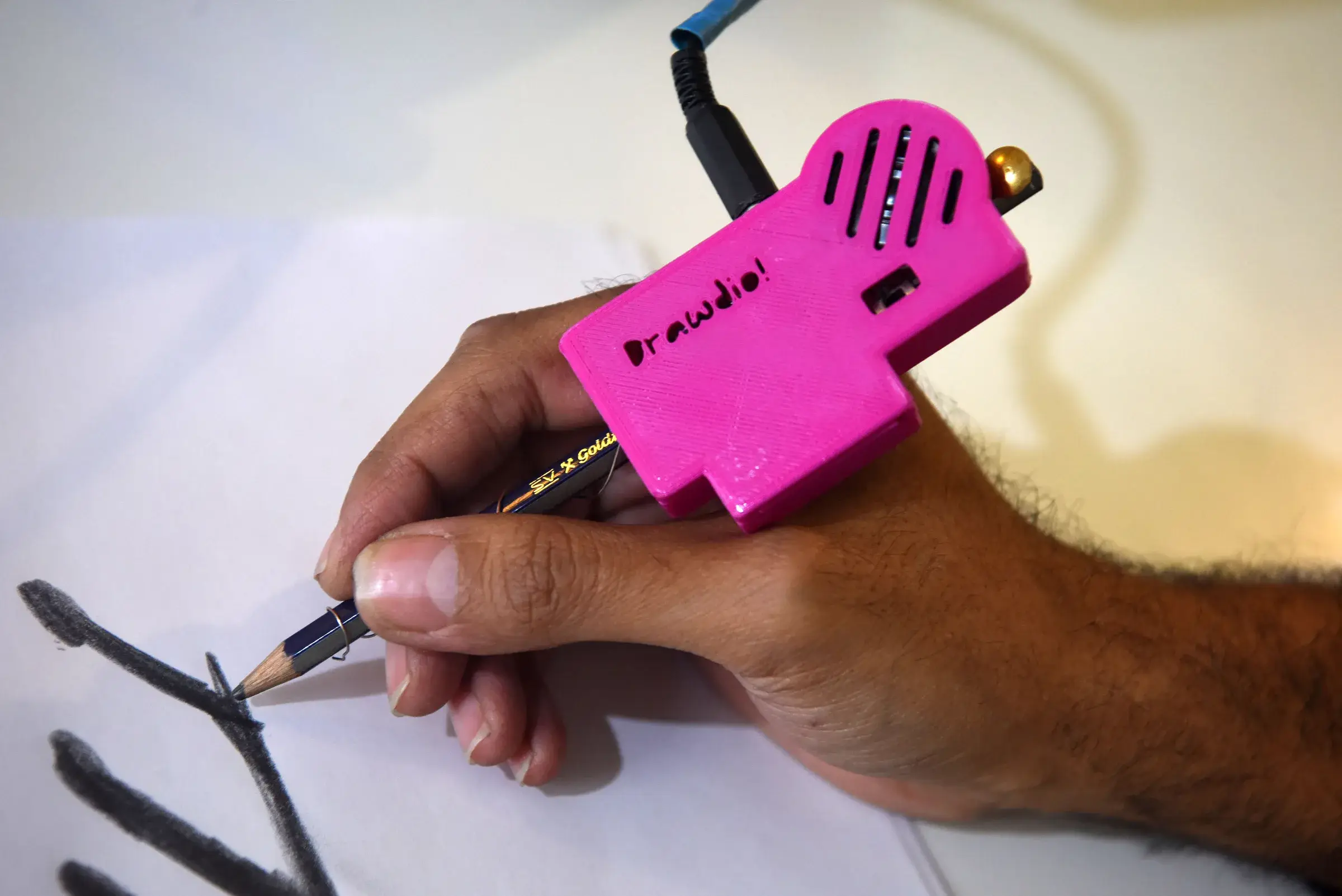 Los Aparatos Drawdio electronic instrument using a conductive drawing