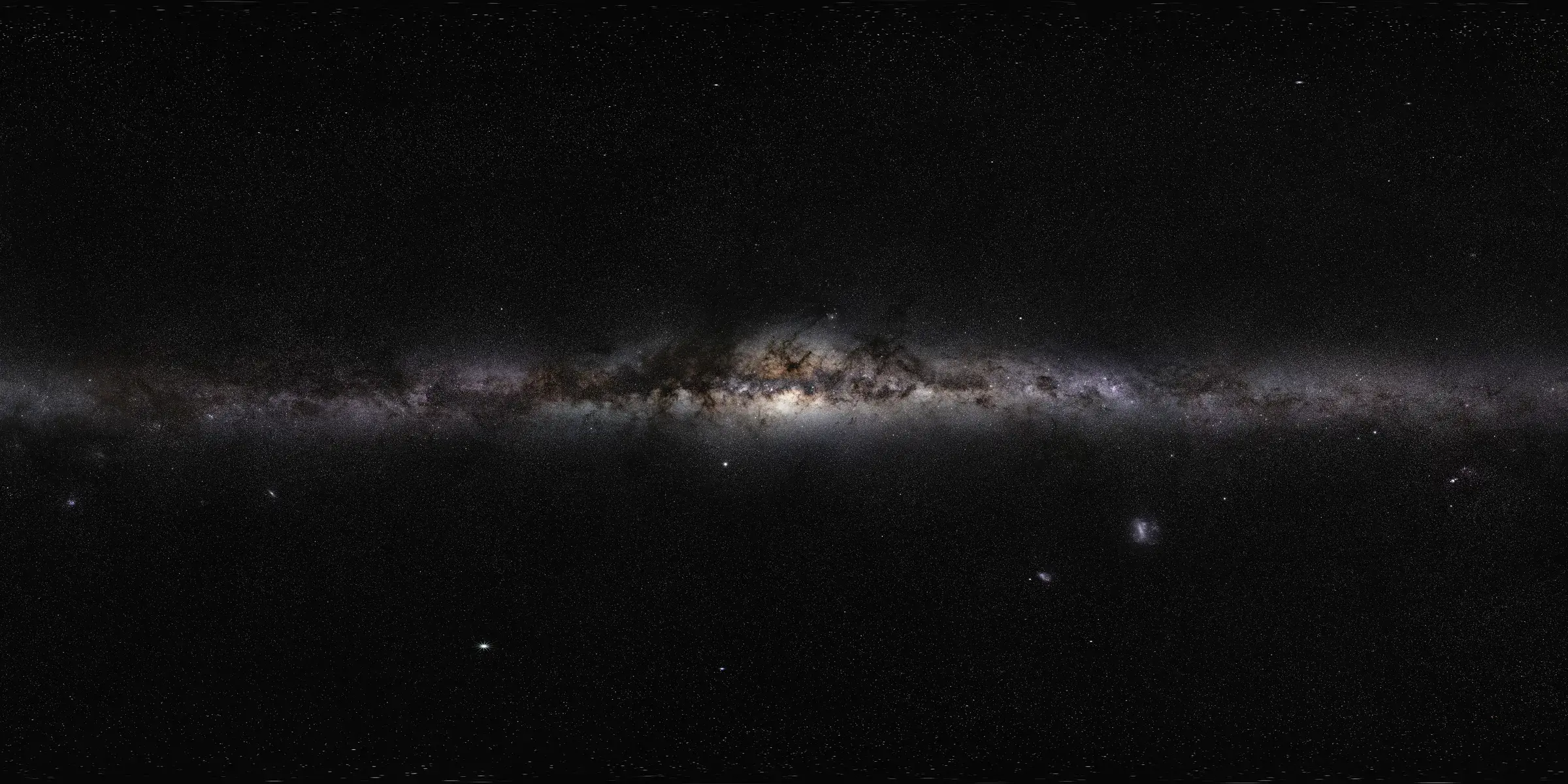 Panorama of the Milky Way: the galactic disk crossed by dark dust bands above an observing site