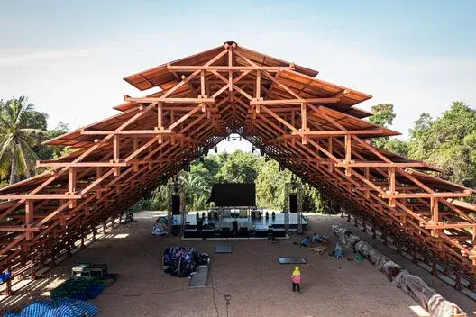 Interior of Neramit showing the square-tube frame and the large open volume under the roof