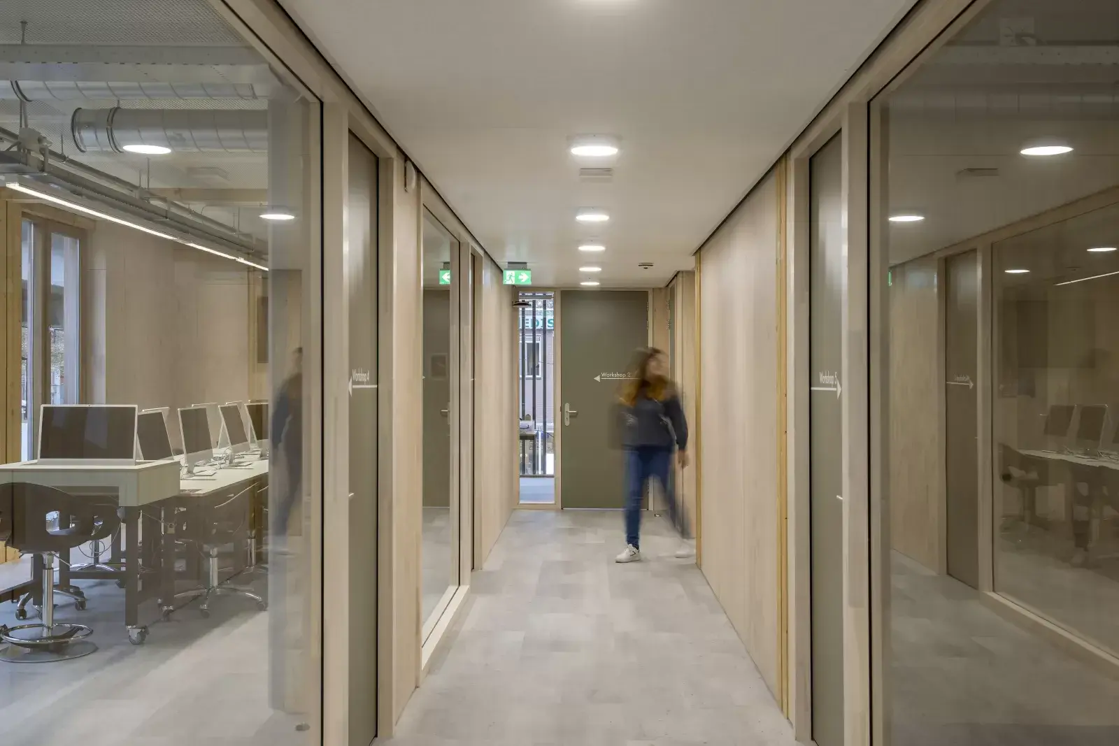 Interior corridor of OBA Next Lab showing timber surfaces and visible technical elements