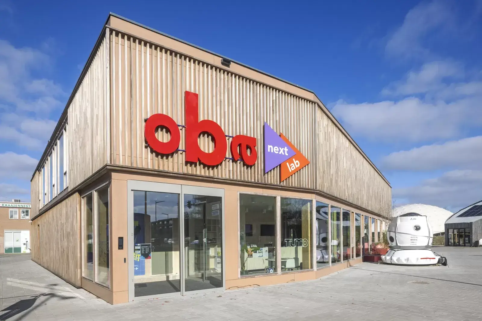 Front of OBA Next Lab showing its timber cladding and entrance