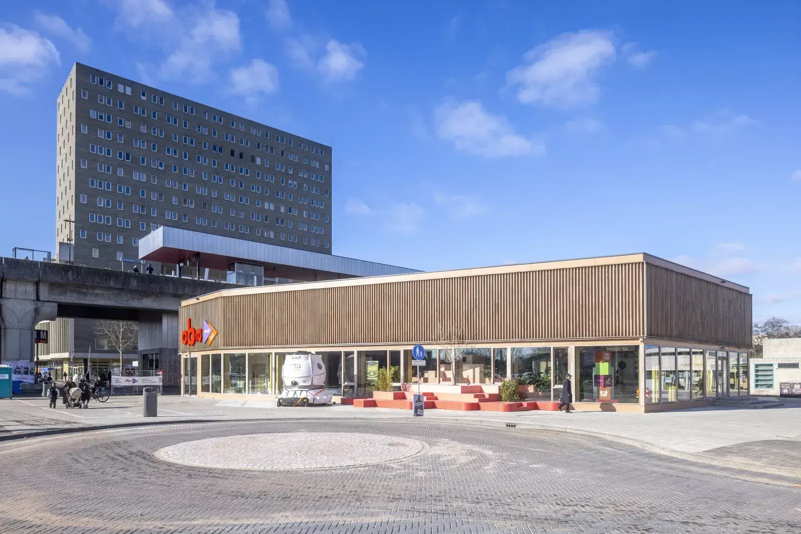 OBA Next Lab at Kraaiennest, a low timber building made from modules around a central public space