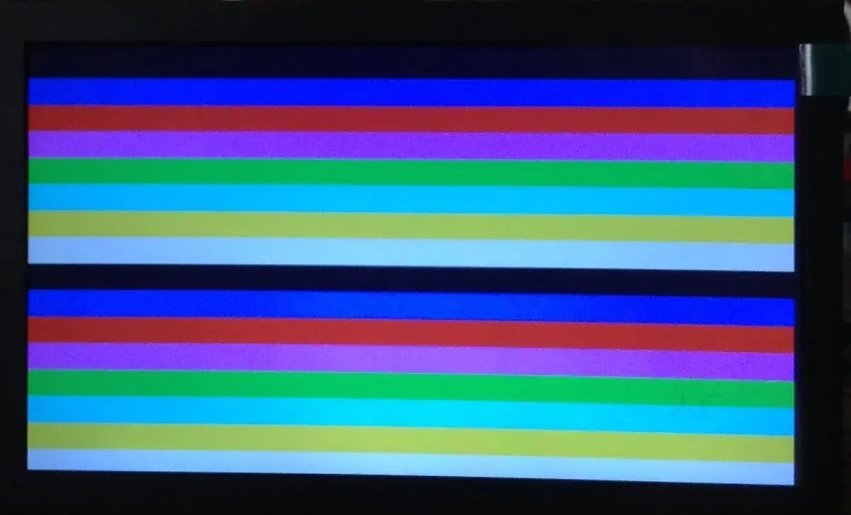 Color bar test card showing ZX Spectrum colors on a VGA monitor connected to a Raspberry Pi Pico