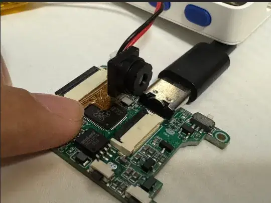 RP2040 board connected to a camera module in the PicoCamera documentation