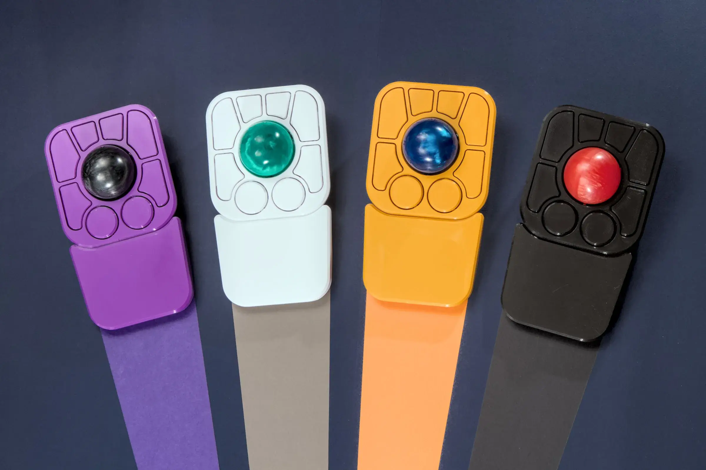 Ploopy A+ trackball with eight buttons around its central ball