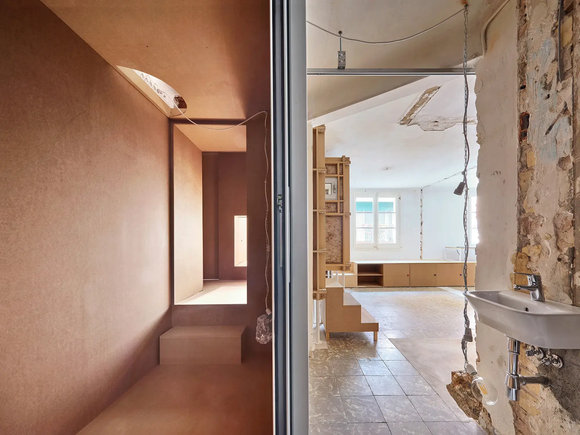 Interior of TAKK's 10K House, built with a deliberately reduced material palette