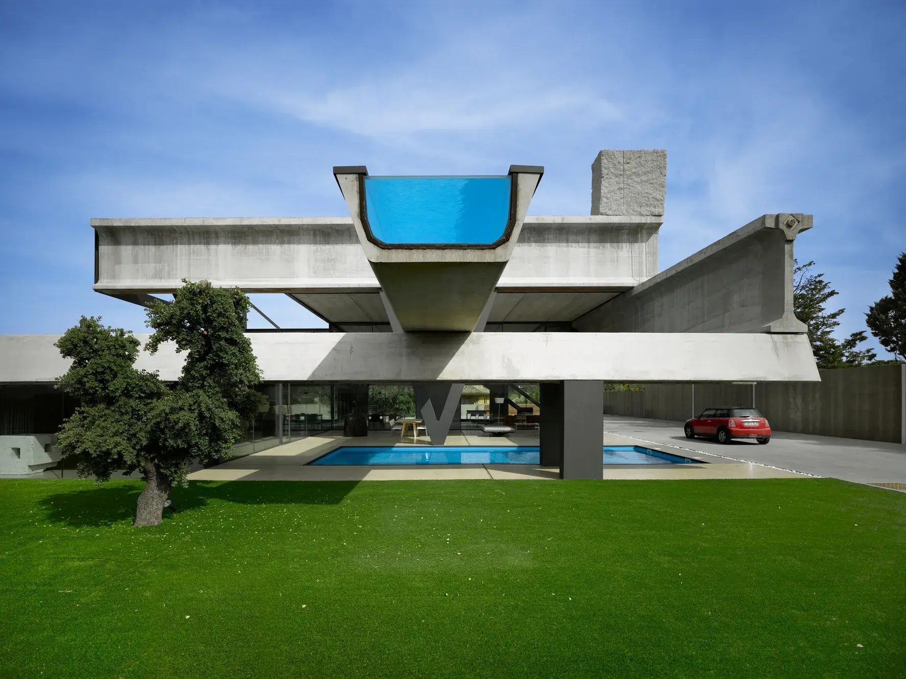 The Truffle by Ensamble Studio, a small mineral-like building embedded in a coastal landscape