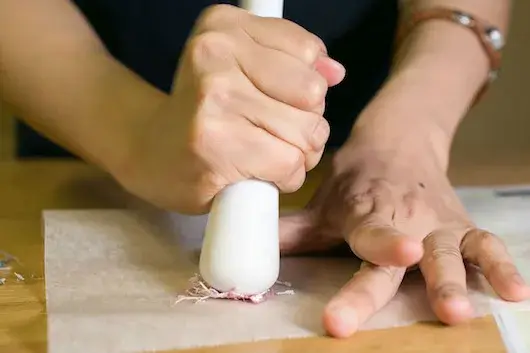 Process stage in a Saya Irie sculpture made from eraser residue