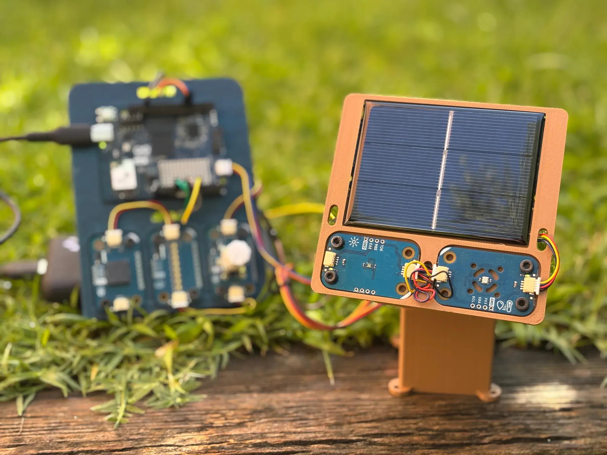 Arduino UNO Q solar tracker prototype on a two-axis 3D-printed mechanism