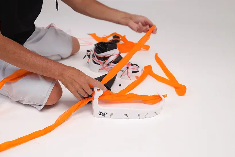 UDRB components showing the white sole, black leather and green rope