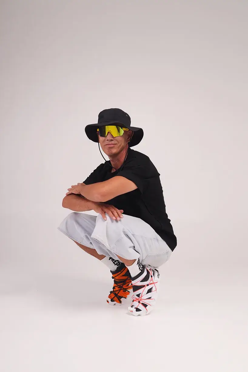 Disassembled UDRB sneaker with printed sole, leather boot and rope shown separately