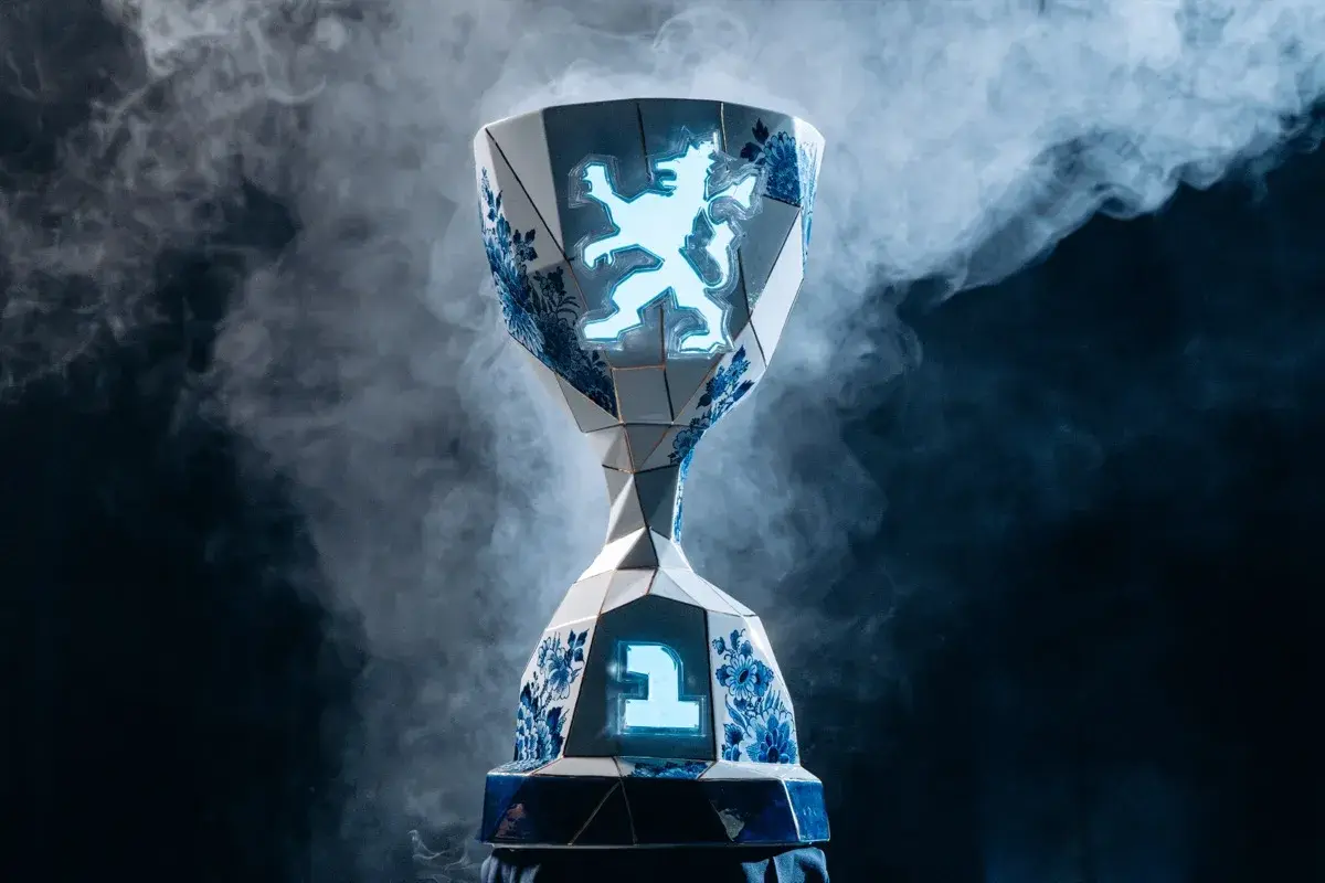 Winner's trophy in Delft porcelain carrying the number 1, photographed in smoke