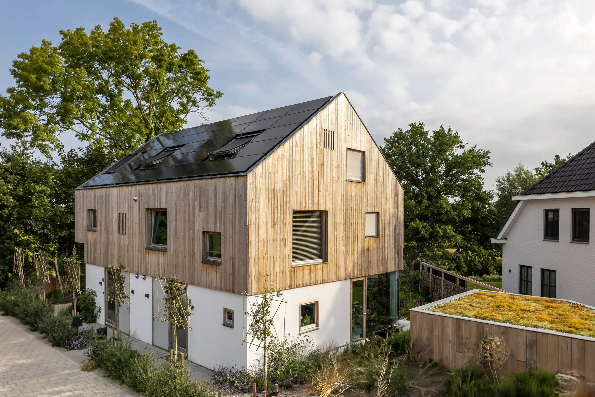 Extérieur du volume de bois CoHouse à Cothen